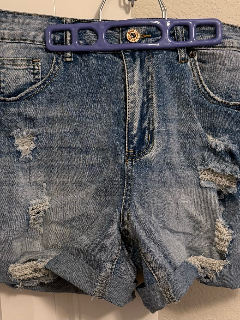 Distressed Light Wash Denim Shorts